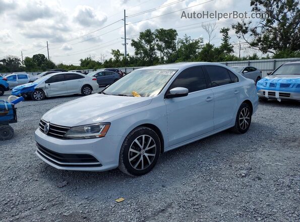 3VWDB7AJ2HM406492 2017 VOLKSWAGEN JETTA Silver Trasero izquierdo