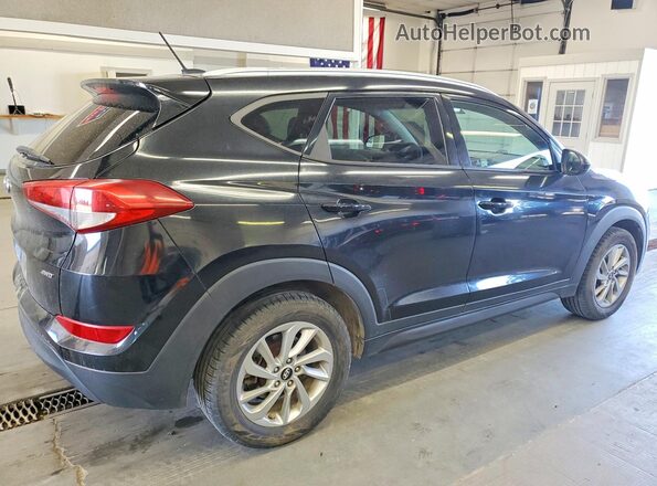 KM8J3CA49GU142764 2016 HYUNDAI TUCSON Black 