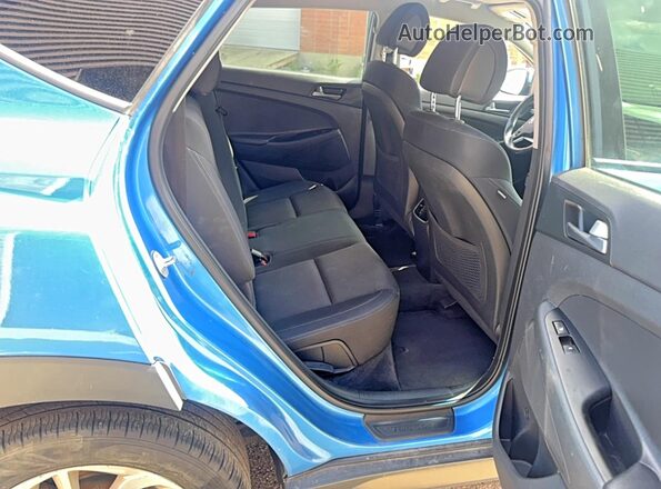 KM8J3CA42GU083136 2016 HYUNDAI TUCSON Blue Vista interior delantera