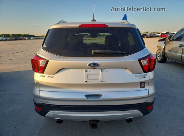 1FMCU9J95KUA82155 2019 FORD ESCAPE Silver Widok wnętrza z przodu