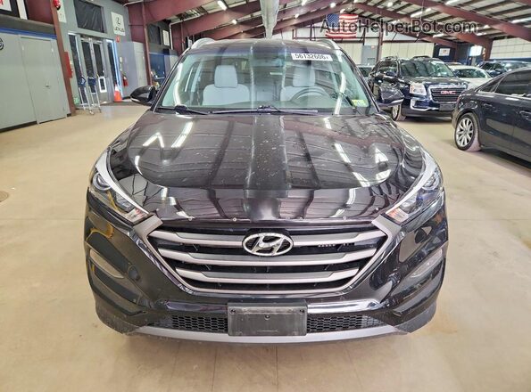 KM8J3CA22GU043878 2016 HYUNDAI TUCSON Черный Вид сзади