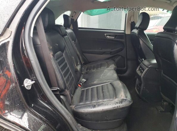 2FMPK4J92PBA25256 2023 FORD EDGE Black Vista interior trasera