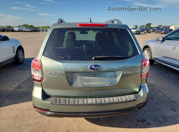 JF2SJABC7GH440751 2016 SUBARU FORESTER Зеленый Вид салона спереди