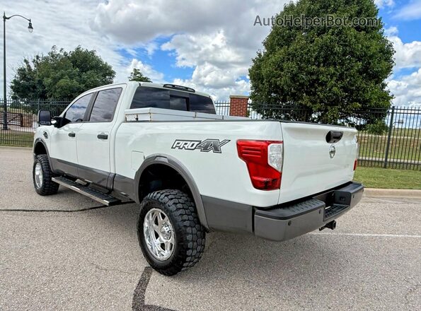 1N6BA1F43GN505403 2016 NISSAN TITAN White Delantero derecho