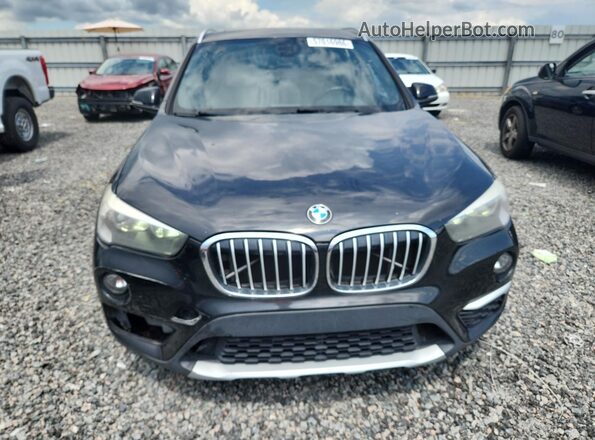 WBXHU7C30J3H43138 2018 BMW X1 Black Vista trasera
