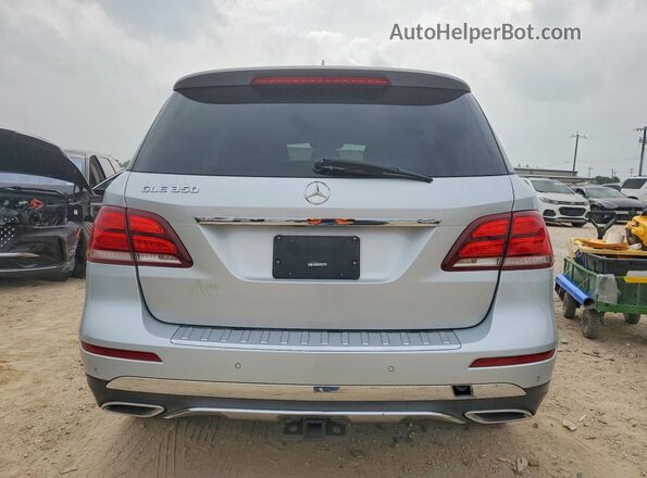4JGDA5JB3JB200271 2018 MERCEDES-BENZ GLE Silver Rear view