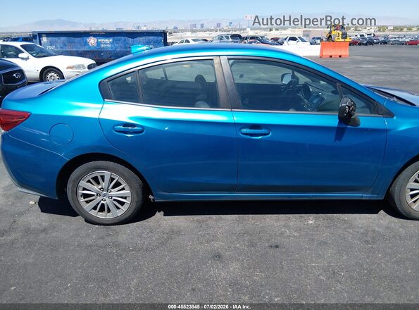 4S3GKAD69J3614235 2018 SUBARU IMPREZA Blue Widok wnętrza z tyłu