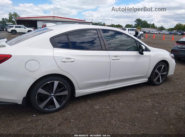 4S3GKAM64H3628974 2017 SUBARU IMPREZA White Rear interior view