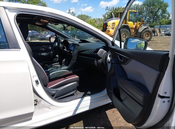 4S3GKAM69M3606396 2021 SUBARU IMPREZA White Widok wnętrza z przodu