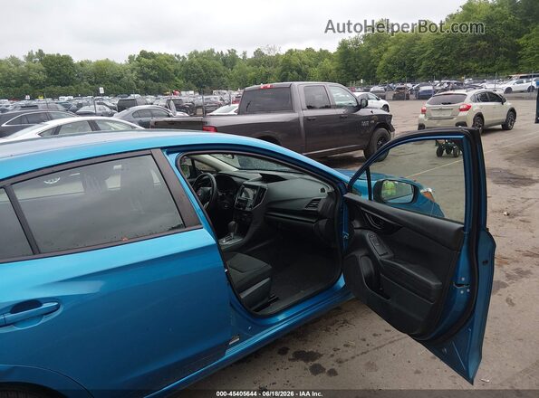 4S3GTAA67K3754285 2019 SUBARU IMPREZA Blue Front interior view