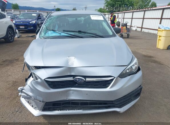 4S3GTAA6XP1711935 2023 SUBARU IMPREZA Серебряный Вид задней части салона