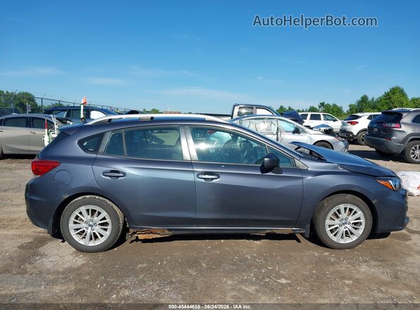 4S3GTAB65H3739744 2017 SUBARU IMPREZA Dark Blue Rear interior view