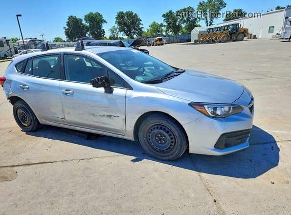 4S3GTAB69P3703408 2023 SUBARU IMPREZA Серебряный Передняя правая четверть