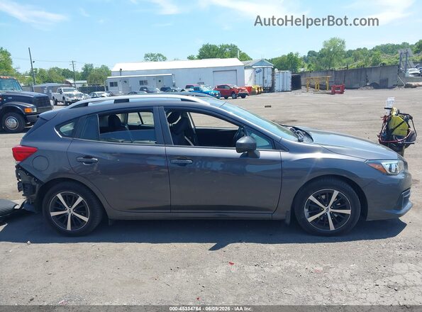 4S3GTAD60L3712201 2020 SUBARU IMPREZA Gray Vista interior trasera