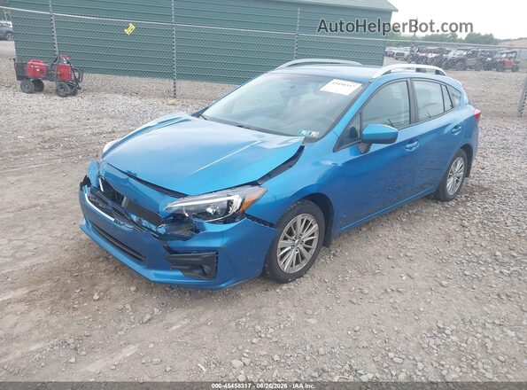 4S3GTAD61J3718795 2018 SUBARU IMPREZA Blue Vista tres cuartos delantera izquierda