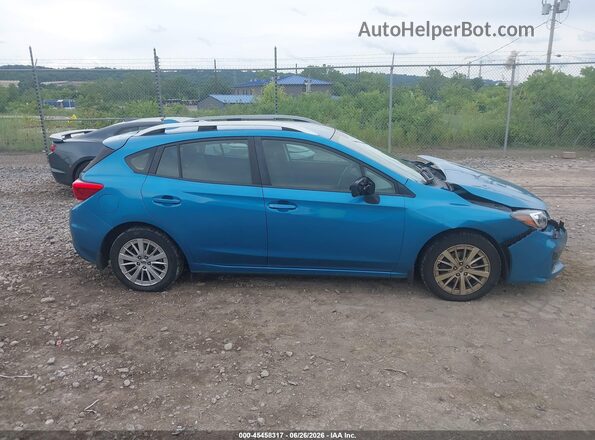 4S3GTAD61J3718795 2018 SUBARU IMPREZA Blue Vista interior trasera