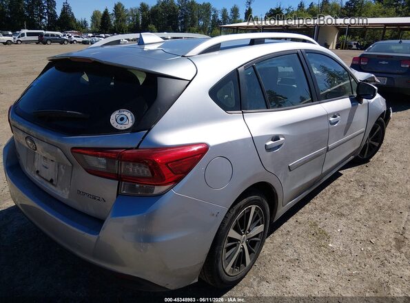 4S3GTAD62P3704462 2023 SUBARU IMPREZA Серебряный Задняя правая четверть