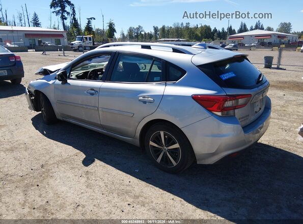 4S3GTAD62P3704462 2023 SUBARU IMPREZA Серебряный Задняя левая четверть