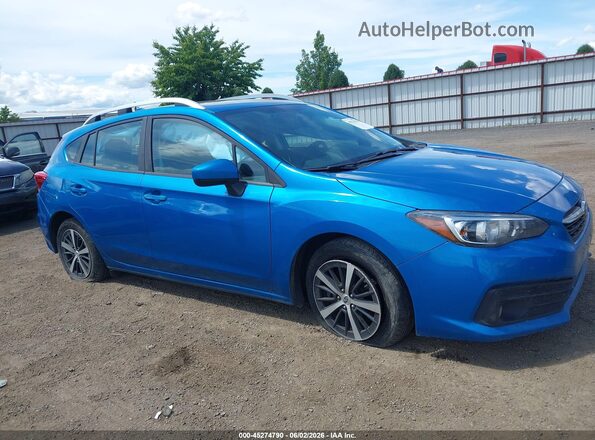 4S3GTAD62P3719639 2023 SUBARU IMPREZA Blue Вид задньої частини салону