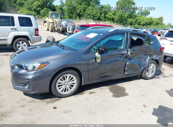 4S3GTAD67J3706392 2018 SUBARU IMPREZA Gray Front view