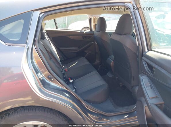 4S3GTAD67J3706392 2018 SUBARU IMPREZA Gray VIN sticker view