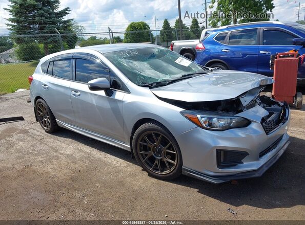 4S3GTAK65H3713192 2017 SUBARU IMPREZA Silver Rear interior view