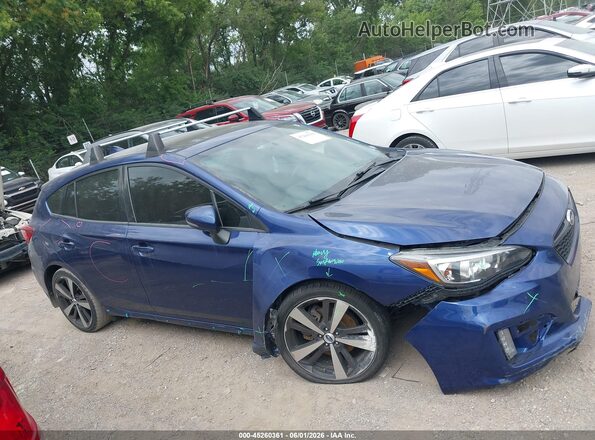 4S3GTAL68H3750591 2017 SUBARU IMPREZA Blue Rear interior view
