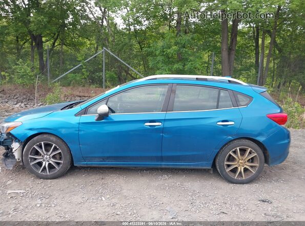 4S3GTAT60K3701554 2019 SUBARU IMPREZA Синий Вид задней части салона