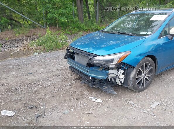 4S3GTAT60K3701554 2019 SUBARU IMPREZA Синий Вид салона спереди
