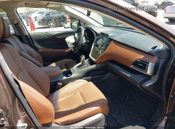 4S4BTGPD9M3145703 2021 SUBARU OUTBACK Brown Вид салону спереду