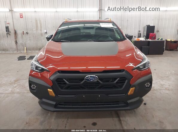 4S4GUHU63R3832603 2024 SUBARU CROSSTREK Orange Rear interior view
