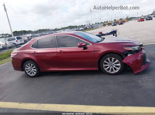 4T1B11HK2KU757944 2019 TOYOTA CAMRY Red Rear interior view