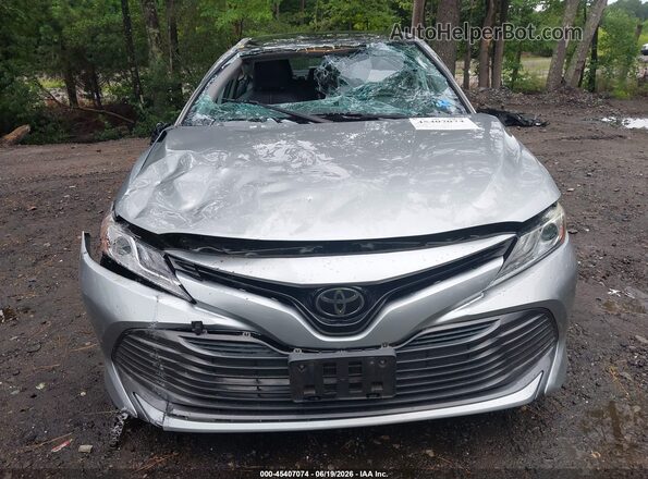 4T1B11HK2KU791933 2019 TOYOTA CAMRY Silver Սարքավորումների վահանակի տեսք