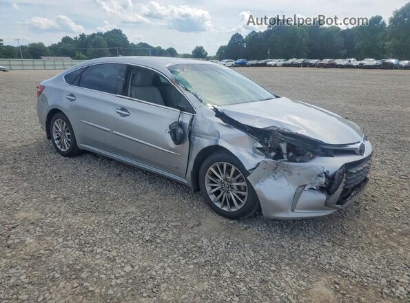 4T1BD1EB2JU060977 2018 TOYOTA AVALON Silver Delantero derecho