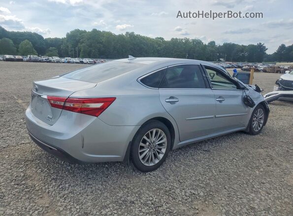 4T1BD1EB2JU060977 2018 TOYOTA AVALON Silver Trasero derecho