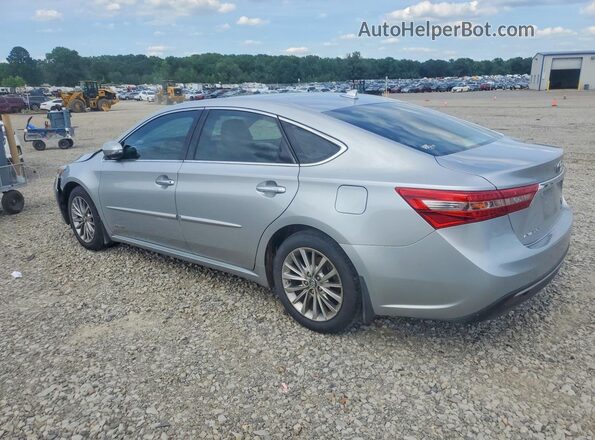 4T1BD1EB2JU060977 2018 TOYOTA AVALON Silver Trasero izquierdo