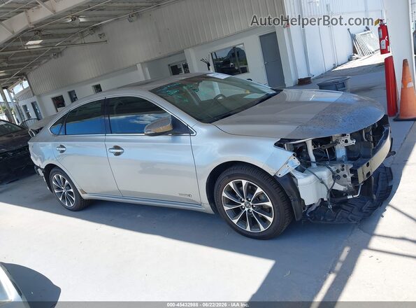 4T1BD1EB9GU053579 2016 TOYOTA AVALON HYBRID Серебряный Вид задней части салона
