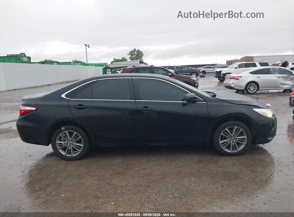 4T1BF1FK0GU125214 2016 TOYOTA CAMRY Black Rear interior view