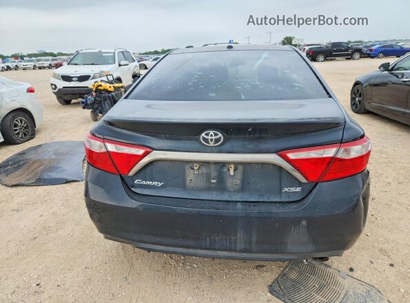 4T1BF1FK2HU633170 2017 TOYOTA CAMRY Black Rear view