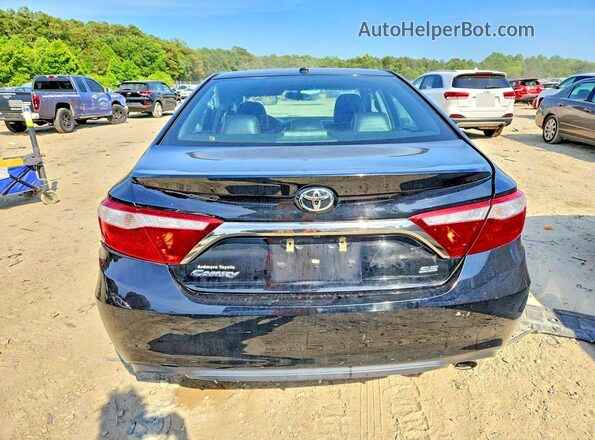 4T1BF1FK3GU565217 2016 TOYOTA CAMRY Black Rear view