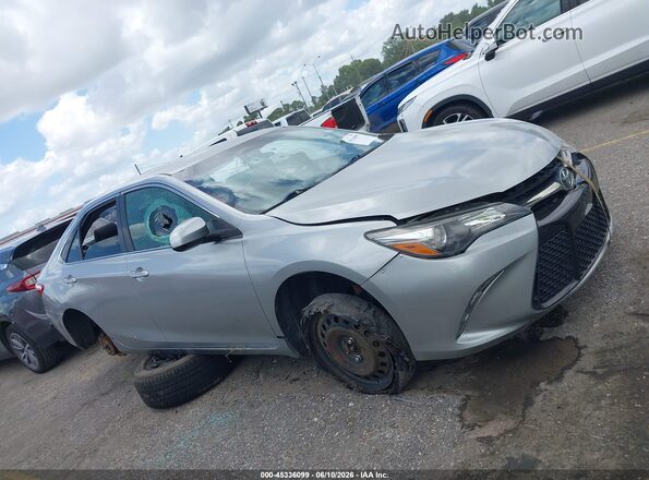 4T1BF1FK5GU175221 2016 TOYOTA CAMRY Silver Սալոնի հետևի տեսք