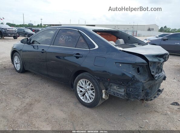 4T1BF1FK7GU609705 2016 TOYOTA CAMRY Black Trasero izquierdo