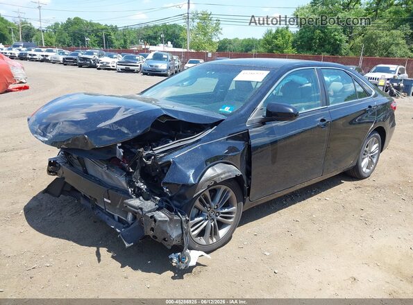 4T1BF1FK8GU241955 2016 TOYOTA CAMRY Black Vista tres cuartos delantera izquierda