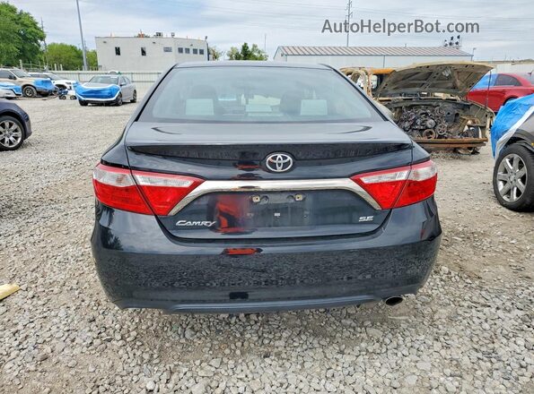 4T1BF1FK8HU338526 2017 TOYOTA CAMRY Black Rear view
