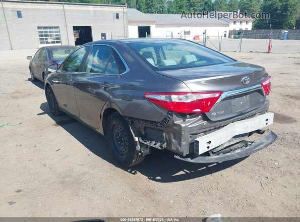 4T1BF1FK8HU619919 2017 TOYOTA CAMRY Gray Trasero izquierdo
