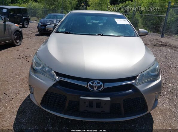 4T1BF1FK9GU564864 2016 TOYOTA CAMRY Золотой Вид спереди