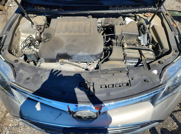 4T1BK1EB0HU253063 2017 TOYOTA AVALON Gold Вид задньої частини салону