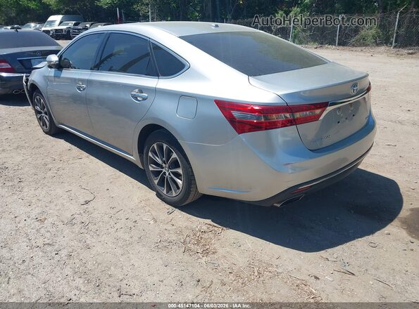 4T1BK1EB0JU288272 2018 TOYOTA AVALON Серебряный Задняя левая четверть