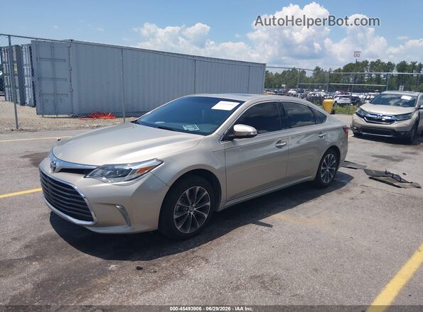 4T1BK1EB2GU231144 2016 TOYOTA AVALON Beige Vista tres cuartos delantera izquierda