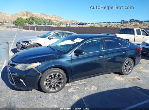 4T1BK1EB2JU266452 2018 TOYOTA AVALON Blue Widok wnętrza z tyłu